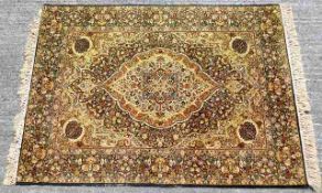 A Persian style rug 83in x 56in
