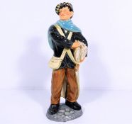 A Doulton Newsboy figure HN2244