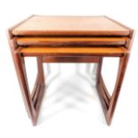 A G-Plan nest of three teak tables