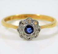 An antique 18ct gold ring with platinum mounted sa