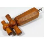 An antique walnut treen corkscrew