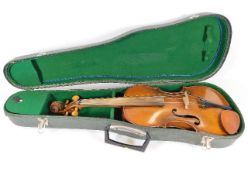 An antique baroque violin, in the style of Jacob Stainer with crocodile style skin style case