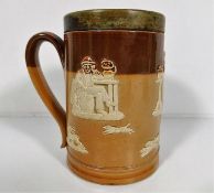 A Doulton stoneware tankard with hunting & ale dri