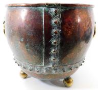 A large 19thC. riveted copper log basket with bras