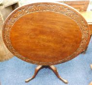 A 19thC. oak tilt top table with tripod pedestal &