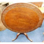 A 19thC. oak tilt top table with tripod pedestal &