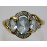 A 9ct gold ring set with blue & white stones 2.9g
