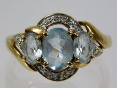 A 9ct gold ring set with blue & white stones 2.9g