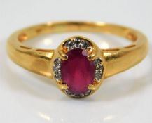 An 18ct gold ruby & diamond ring 3.8g size R