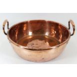 A c.1800 copper pan with handles W15in x D4.5in. P