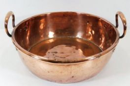 A c.1800 copper pan with handles W15in x D4.5in. P