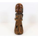 A 19thC. carved tribal art figure 9.5in tall