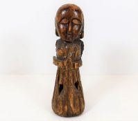 A 19thC. carved tribal art figure 9.5in tall