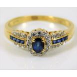 An 18ct gold diamond & sapphire ring 2.6g size M