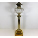 A Victorian brass corinthian column oil lamp 25in