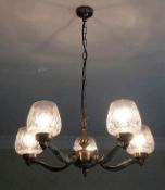 A five armed hanging light fitting with brushed me