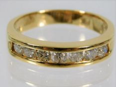 An 18ct gold half eternity ring set with approx. 1