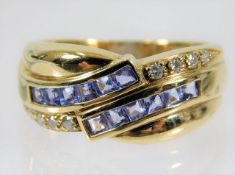 A 14ct gold tanzanite & diamond ring 4.8g size N