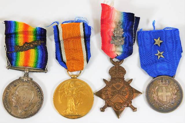 A WW1 medal set awarded to Lt. Commander J. Edwards Royal Navy with oak leaf twinned with silver WRN