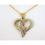 A 9ct gold chain & heart shaped pendant set with a