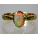 An 18ct gold ring set with opal 4.5g size S