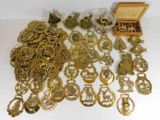 A quantity of approx. sixty five various horse brasses twinned with various other brass items