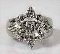 An 18ct white gold ring set with 37 diamonds in a