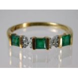 A 9ct gold ring set with emerald and diamond 2.2g size T