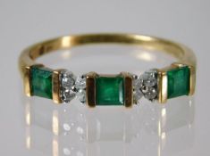 A 9ct gold ring set with emerald and diamond 2.2g size T