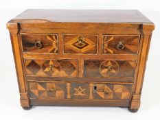 A Victorian masonic marquetry chest 12.25" tall by 15.75" wide