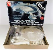 A boxed Star Trek AMT USS Enterprise NCC 1701 Model kit bagged and sealed 1979