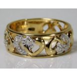 A 9ct gold ring with fretwork banding set with diamond 2.7g Size N/O