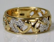 A 9ct gold ring with fretwork banding set with diamond 2.7g Size N/O