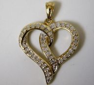 A 9ct gold pendant set with 0.25ct diamonds 1.7g