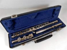A cased plated flute