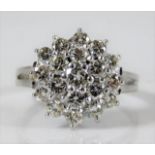 An 18ct white gold diamond cluster ring set with approx. 1.64ct diamond 5g size P/Q
