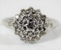 A 14ct white gold ring set with diamonds of approx