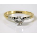 An 18ct gold diamond solitaire ring set with platinum mounted 0.75ct diamond of good colour & clarit