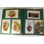 A postcard album and two Wills Cigarettes picture