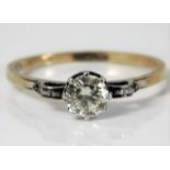 An art deco 18ct gold diamond solitaire ring with platinum mounted diamond of 0.75ct, 2.4g size S