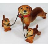 Goebel dachshund trio approx 3.25"