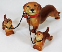 Goebel dachshund trio approx 3.25"