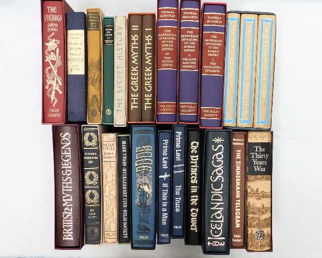 Twenty Four books published by Folio Society including Captain Cook's Voyages 1768-1779 and Mark Twa