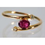 An art deco period diamond and ruby ring tests as 14ct rose gold 1.5g size L