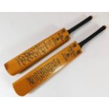 Two miniature cricket bats dated 1964 with team au