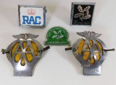 Two AA badges, two Nationa Trust badges and one RA