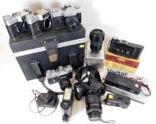 Minolta 25mm camera with 70:210mm lens, Sigma 70:2