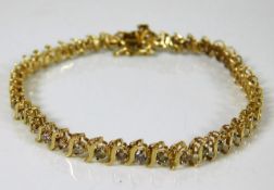 A 10ct gold line bracelet set with 2ct diamond 7.5