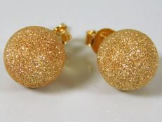 A pair of 18ct gold earrings 4.2g