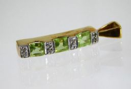 A 9ct gold pendant set with peridot and eight small diamonds 0.7g